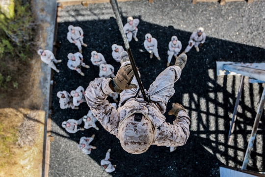 U.S. Marine Sgt. Andrew Shelly rappels from a tower during a helicopter rope-suspension techniques masters course aboard Camp Pendleton, Calif., Oct. 14, 2014. Shelly is a machine gunner with Battalion Landing Team, 3rd Battalion, 1st Marine Regiment, 15th Marine Expeditionary Unit.  BLT 3/1 is deploying this spring as the 15th MEU’s ground combat element. (U.S. Marine Corps photo by Cpl. Steve H. Lopez/Released)